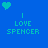 Two side-by-side pixel art display 'I LOVE SPENCER' text with heart symbols; left is blue background with cyan elements, right is teal background with dark blue elements