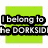 Green square icon with black text reading "I belong to the DORKSID" and "With my LEADER" in two sections, plus "CARLOS!" below.