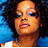 Pixelated image of a person with curly hair and blue clothing, next to large light-blue text reading "FeFe" on black background.