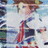 Pixelated static image of a character with brown hair, light skin, and red clothing against a blue sky background.