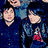 Pixelated image of three people in blue clothing with red accents, overlaid by red text on black and gray backgrounds.