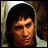 A person with dark hair and a light hooded garment appears in six , each showing different text overlays