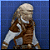 Pixelated character with light brown hair and beard wears brown vest over white shirt against blue background
