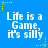 Blue background with white pixelated text reading "Life is a Game, it's silly" repeated six times in two of three, surrounded by yellow and green star-shaped pixels