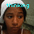 A four- shows a person with dark skin wearing a white headwrap and light-colored top, with cyan text changing