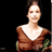 Static 48x48 pixel icon of a person in a brown dress with white neckline against black background, rendered at 256x256 pixels with visible dithering and low-resolution artifacts.