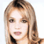 Static pixelated image of a person's face with light brown hair and neutral expression on white background.