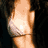 A four- shows a woman with long dark hair in a white bralette, with the top-left displaying a blurred face and the bottom-right showing a clear face