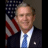 Static contact sheet frame showing a political figure with text about George W. Bush winning an election, displayed in cyan pixelated font on black background.