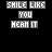 Pixelated text-based icon with 'SMILE LIKE YOU MEAN IT' in white and yellow on black background, animated sequence showing sequential letter changes.