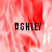 Red and white pixelated background with three instances of the text 'ASHLEY' in black block letters, one at top-left, one at top-right, and one at bottom-left.