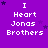 Purple background with white text reading "I Heart Jonas Brothers" and scattered dark purple stars, arranged in a of repeated identical elements