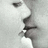 A grayscale animated icon shows a side-profile face with text reading "Nicholas landolo <393" on the right.