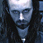 A pixelated image of a person with long dark hair and a silver necklace, next to blue text reading 'UNDERWORLD' on a black background.