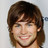 Static 48x48 pixel buddy icon showing a close-up of a person with brown hair and light skin, smiling against a plain background.