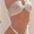 Static 50x50 pixel icon showing a partial view of a person in brown swimwear with white trim against a light background.