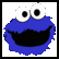 Pixelated blue cartoon character face with large white eyes and black pupils, wide open mouth showing black interior, on gray background.