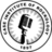 Circular emblem with toothbrush symbol and text, blue text reading 'Case Men's Glee Club', 'Aurally Pleasing Women', and 'Since 1897' on white background.