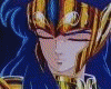Animated sequence of a character with blue hair and golden armor performing actions including eye movements, hand gestures, and light effects.