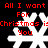 Red text on black background reads "All I want For Christmas is You" above four white snowflakes arranged in a