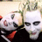 Two pixelated faces with white makeup and dark eyes appear on the left, while red text reads "TWIZTID" on a black background to the right.
