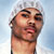 Pixelated static image of a person's face and upper neck against a light blue background with white highlights.