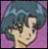 Pixelated portrait of a person with teal hair against a purple background, smiling with visible teeth and a light-colored top.