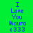 Green and pink pixelated displays 'I Love You Maura <333' text with alternating background colors across three