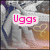 Pixelated image with pink text 'Uggs' on a white rectangle over a blurred background of gray, blue, and brown tones.