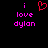 Pixelated text and a heart symbol on a black background, with a red heart replacing the 'i' in 'i love dylan' on the left side.