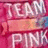 A static image displays 'TEAM PINK' text in white with a pink background and orange gradient bar.