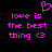 Pixelated pink text on black background reads "love is the best thing <3" with a heart symbol above, displayed in two identical side-by-side