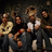 A pixelated group photo of five people in casual clothing with text overlays reading 'Modina Lake' and 'Join The River People'.