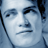 Pixelated grayscale portrait of a person's face with neutral expression, rendered in low-resolution 48x48 icon format using blue and white tones.