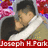 Two people embrace in a close-up pose with one person wearing a white scarf, set against a floral background with red and purple flowers.
