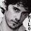 Pixelated grayscale portrait of a person with dark hair, side profile facing right, vertical text 'MILO' on the right edge.