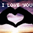Pixelated image with 'I LOVE YOU' text above a heart shape against dark background and gradient sky.