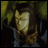 Pixelated image of a character with brown hair and a blue garment against a greenish background, next to text reading "AnimeIM" and "com" on black.