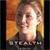 Pixelated static image of a person's face with warm orange-yellow background and dark clothing, likely from an old AIM buddy icon collection.