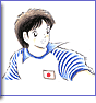 A pixelated anime-style character with brown hair wears a blue-and-white striped shirt featuring a small Japanese flag patch on the chest.