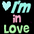 A 2x2 contact sheet of three animated frames showing a pixelated 'I'm in Love' text design with heart symbols, each frame displaying different color variations against a black background.