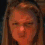 A static image of a person with long light brown hair, showing three distinct facial expressions across a