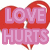A pixelated red heart shape with pink text reading 'LOVE HURTS' overlaid, featuring a small white cross symbol at the center of the 'O' in LOVE.
