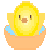 Pixelated yellow chick with brown beak and black eyes emerging from cracked orange eggshell, blue water droplets visible on shell edges.