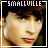 Two side-by-side pixelated frames of a person with dark hair and light skin, each in a white-bordered square frame with pink text at the top reading "SMALLVILLE" on the left and "ADDICT" on the right.