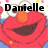 Red cartoon character with orange nose and blue collar, smiling with text "Danielle loves ELMO!!!" in black font over pixelated background.