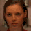 A person with brown hair and a red top appears in three showing subtle facial expression changes against a light background