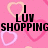 Pink background with pixelated hearts and bold black text reading 'I LUV SHOPPING' in a retro digital style.