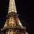 Pixelated Eiffel Tower on left, green text 'I wish I was back in paris!' on right against dark background.