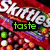 A Skittles candy bag with colorful candies visible, featuring text overlays that change across frames.